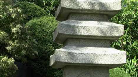 detail of a stone pagoda in a japanese garden