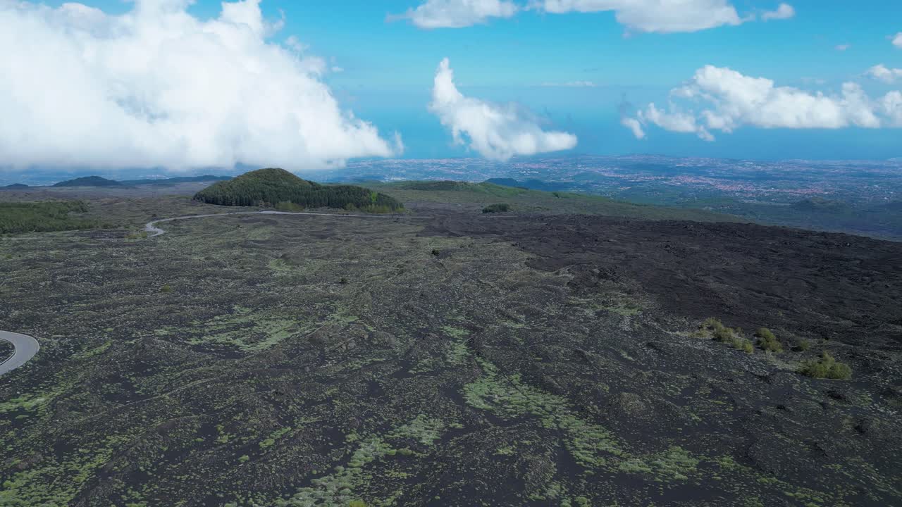 Aerial drone footage of the Etna surroundings: volcanic terrain, forests, lava fields and panoramic views. Ideal for nature, travel and geological landscape projects