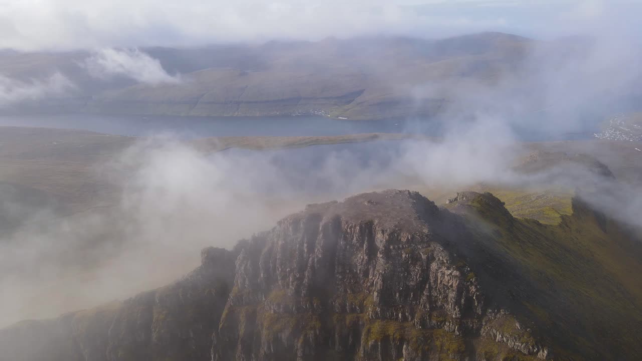Circular drone footage of the Sl&aelig;ttaratindur summit on the Eysturoy island in the Faroe Islands