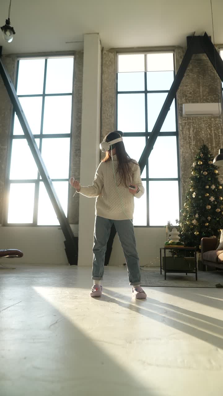 크리스마스에서 vr 헤드을 사용하는 여성