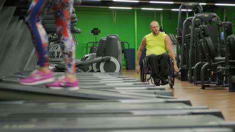 man with disabilities training in the gym of rehabilitation center