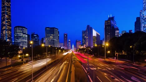 nighttime cityscape with traffic lights