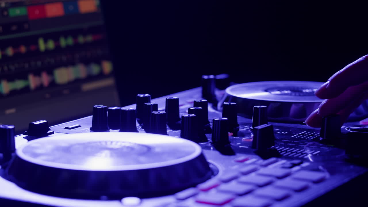 Close-up shots of a DJ's hands mixing music, showcasing the turntables, faders, and lively atmosphere.