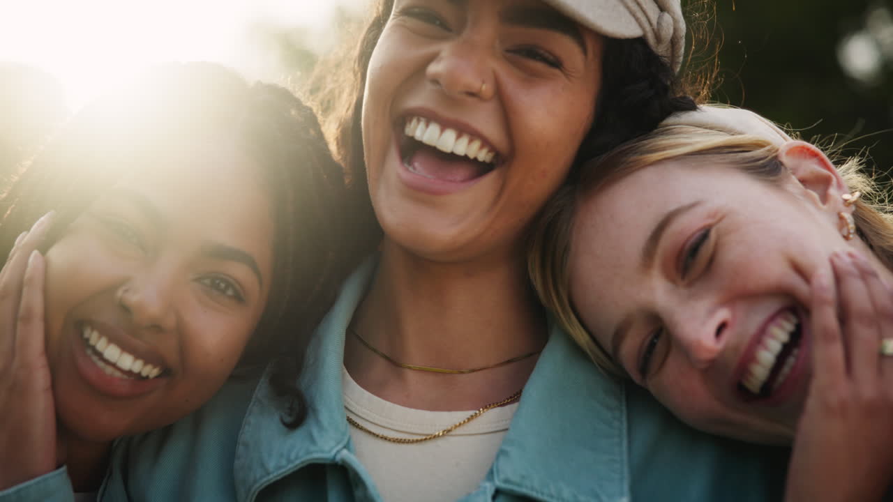 Three Diverse Women Sharing a Moment of Joyful Laughter