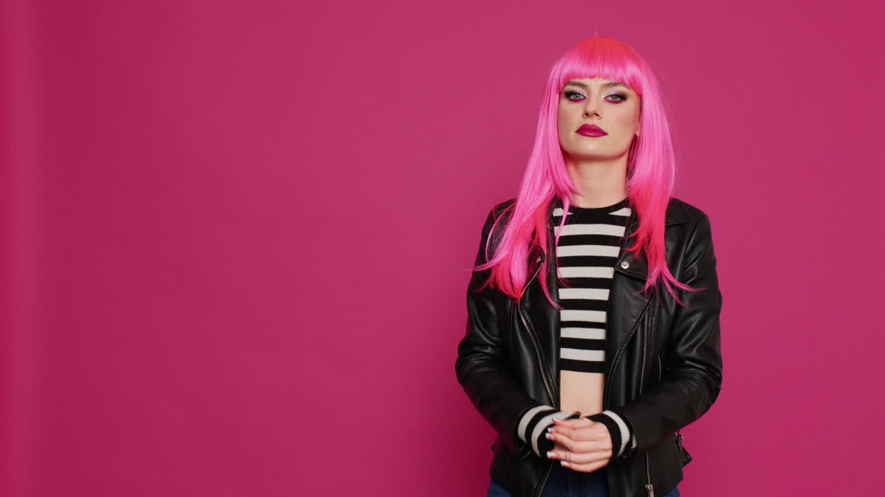 Young female model doing prayer hands and begging for good luck