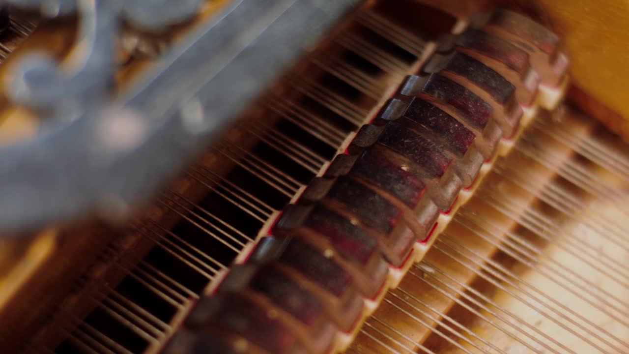 Dusty old moving hammers inside Grand Piano