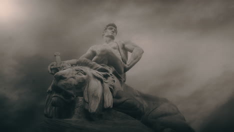 epic, ancient stone statue on cloudy day and windy weather.