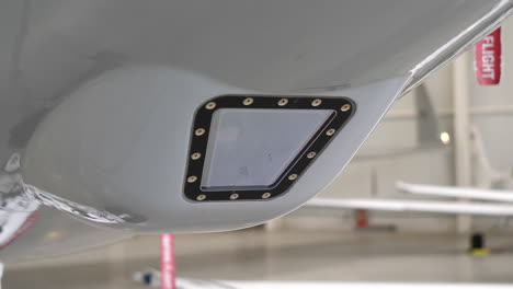 flir forward looking infra red camera in jet aircraft's nose, close up