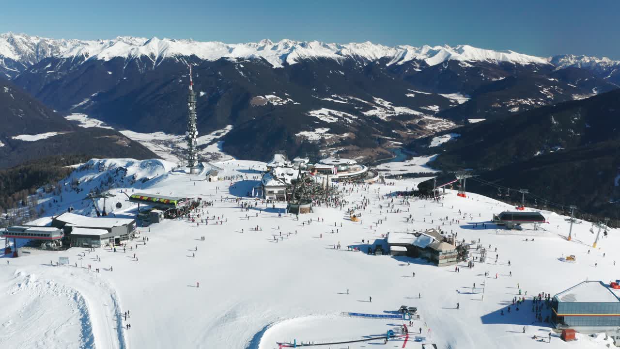 Aerial View of a Busy Ski Resort in the Snowy Mountains
