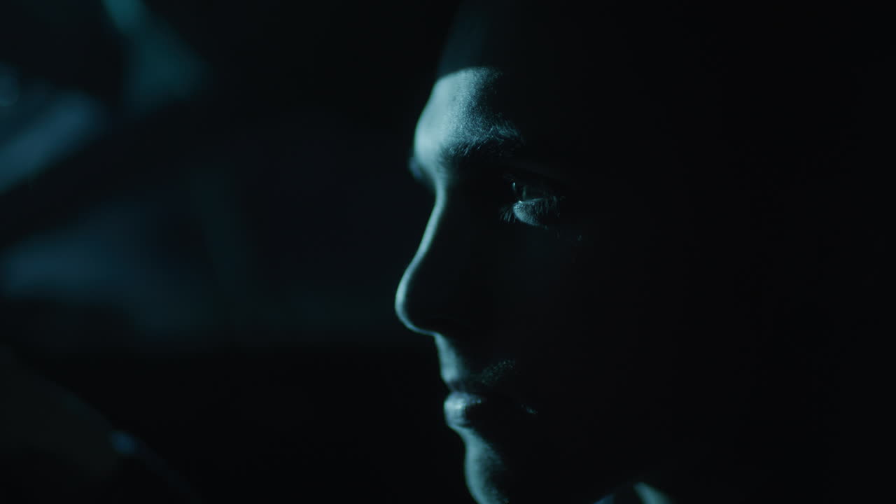 Profile of a man in the dark