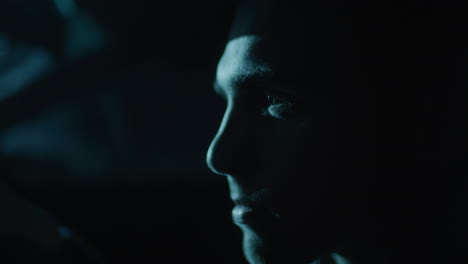 profile of a man in the dark