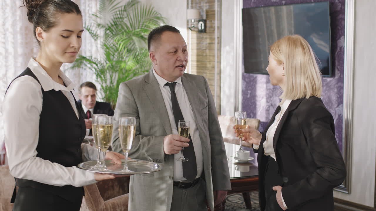 Business Partners At Champagne Reception