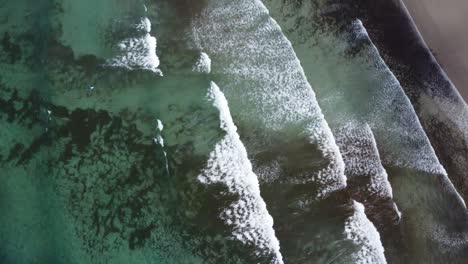waves from above non the beautiful beach of famara, perfect sunny weather