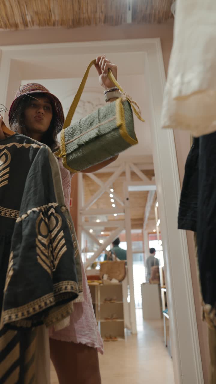A woman shopping for clothes in a boutique