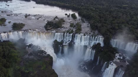 aerial view of staircase basalt waterfalls in south america surrounded by amazon rainforest - crashing mass of water downhill