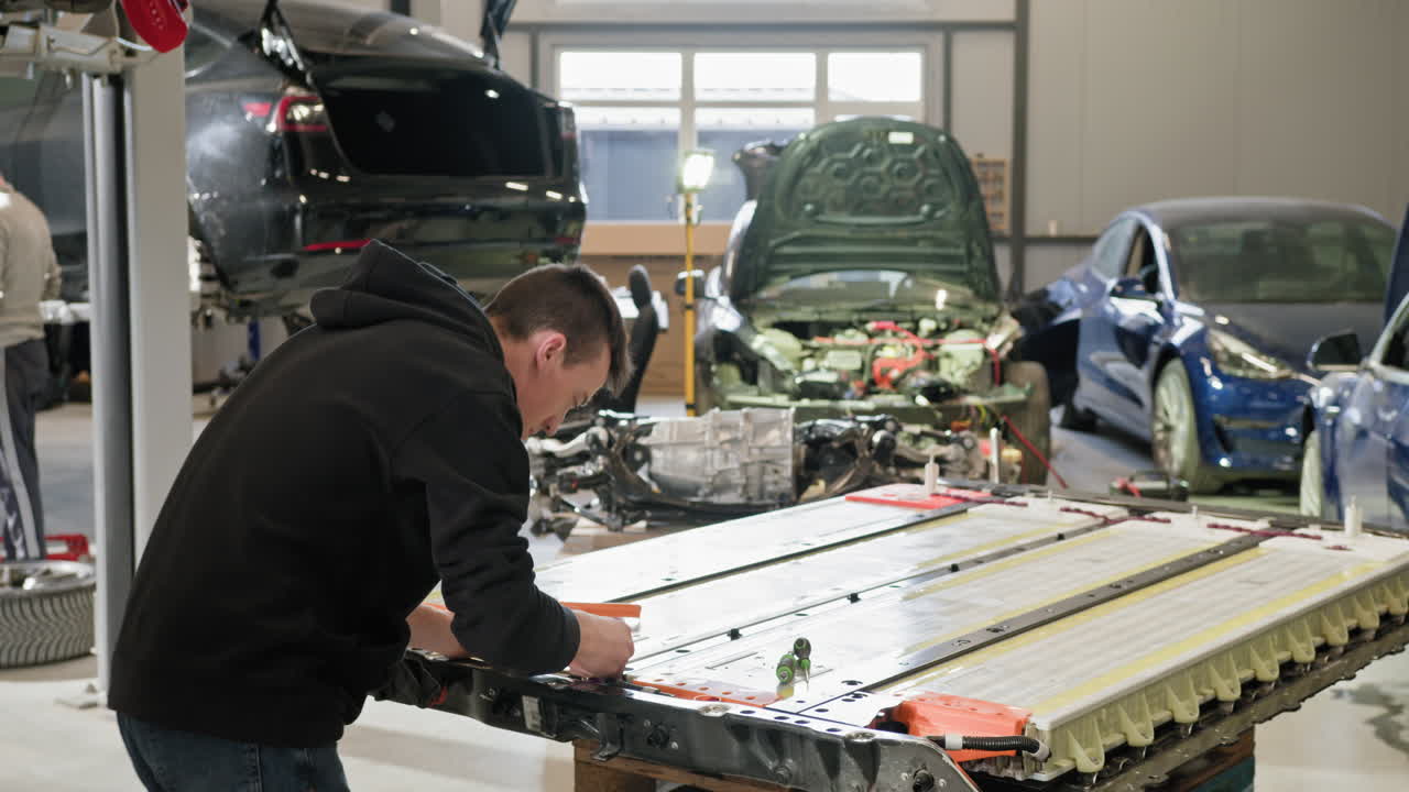 Electric Vehicle Battery Repair in a Workshop