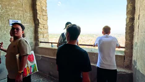 friends admire cityscape from historic lookout point