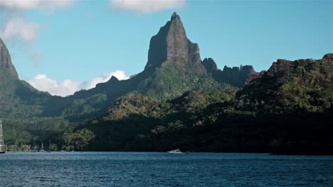 spectacular mountain cliff face and peak on the tropical island of moorea in the south pacific