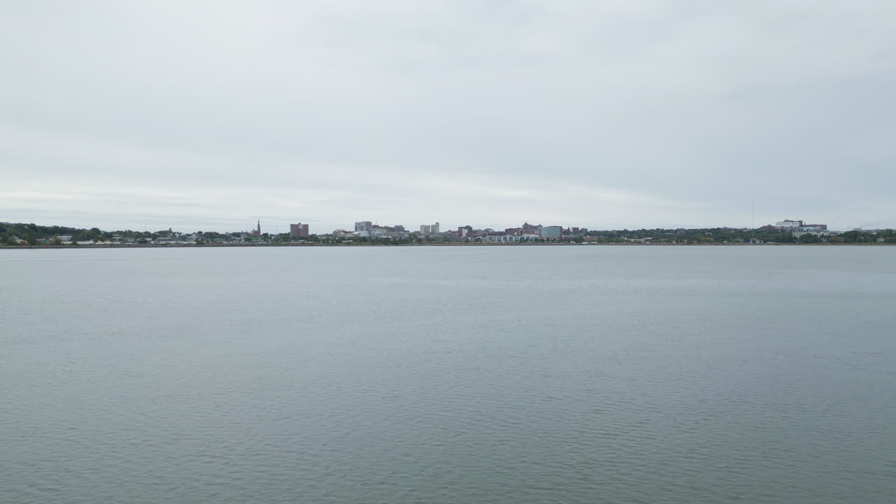 Drone footage capturing Bayside or Back Cove Suburb with oceanfront in Portland Maine, USA.