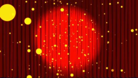 animation of golden dots falling over red curtain