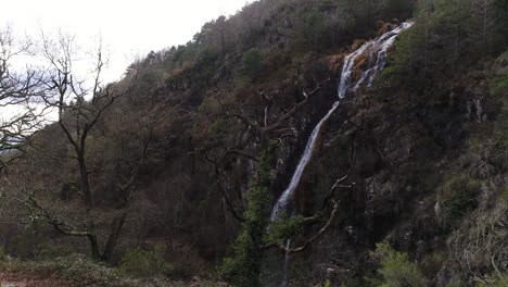 pure mountain water flows over rocks