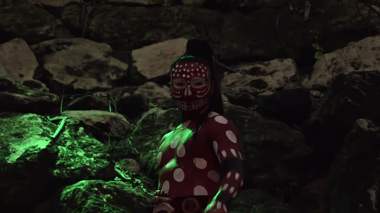 Mayan Warrior Skin Painted with Red Poker Dots Xcaret Night Show