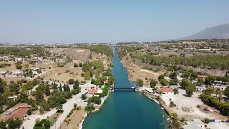 high angle aerial drone shot of corinth canal, pan turn