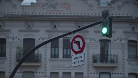 traffic lights and prohibitory sign over the road