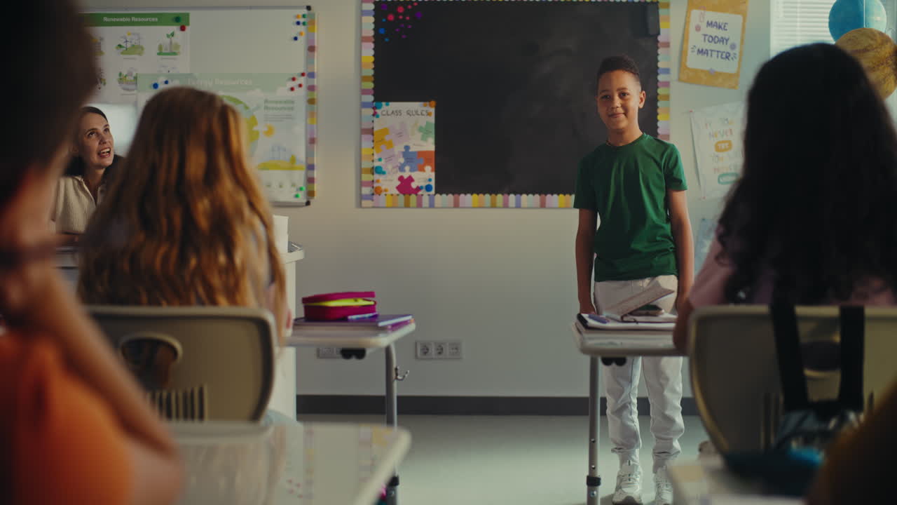 STEM Class Boy Presenting Homework on Ecology in Front of Classmates and Teacher