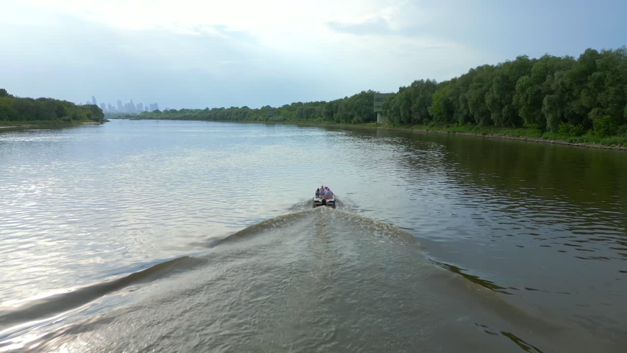 City skyline background, water motion, boat excursion, Vistula river