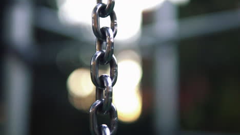 stainless steel short link chain with bokeh background