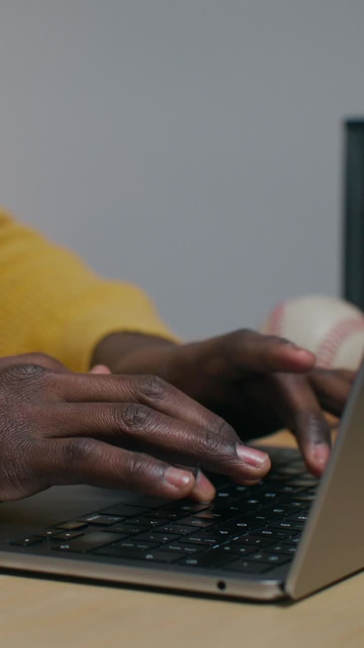 Person typing on a laptop
