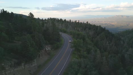 Asphalt-Road-Over-Mountains-With-Coniferous-Forest-Near-Estes-Park,-Northern-Colorado