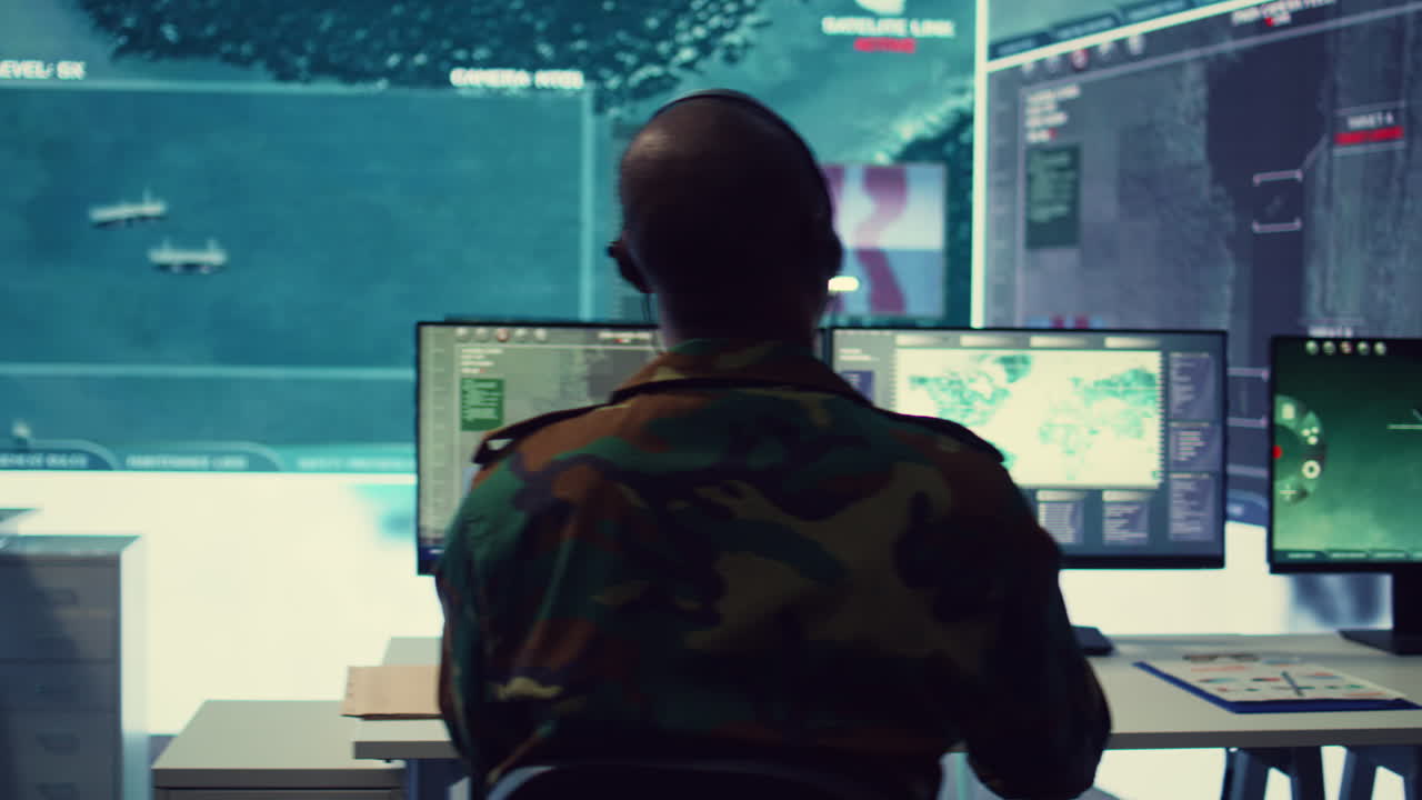 Military personnel employing the army satellite reconnaissance system