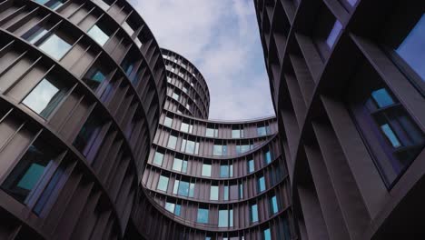low angle view of futuristic multistory building facade in copenhagen