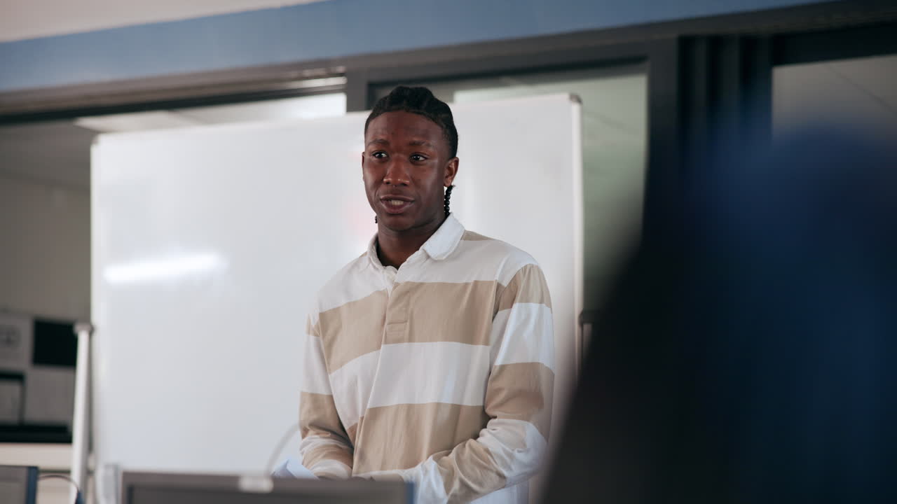 Man giving a presentation in an office