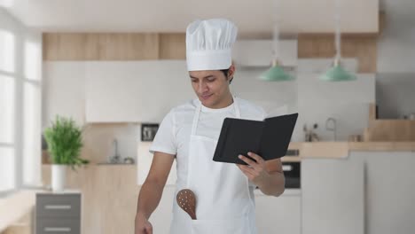 chef profesional indio haciendo comida con emoción