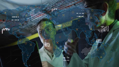 world map against diverse male and female engineers with laptop working in server room
