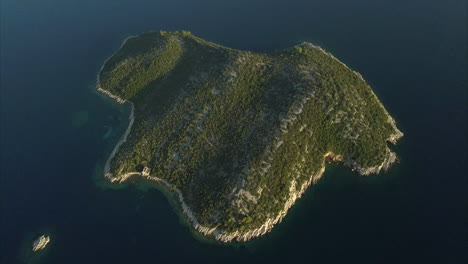 birds eye view of small uninhabited island in the adriatic sea