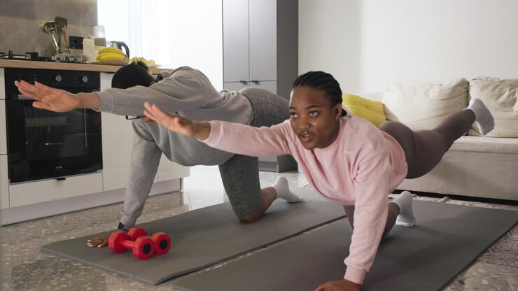 Women doing sports in mat
