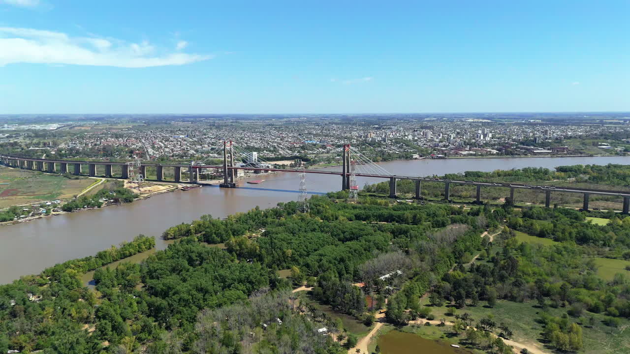 Aerial tour of Bartolomé Mitre Zárate Brazo Largo Bridge over Parana River, Argentina