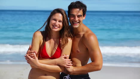 smiling couple hugging each other
