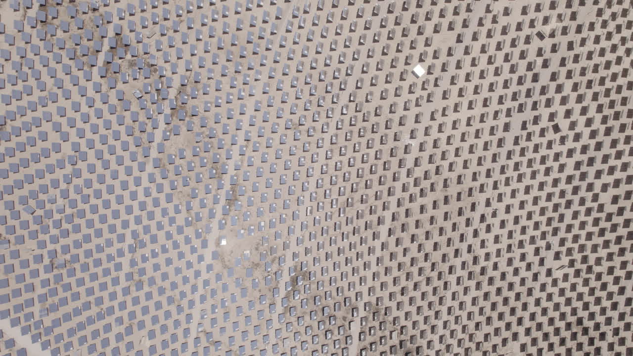 Raw file - Computerized mirrors following the sun's movement and The light reflected from the mirrors to heat water for energy - Ashalim Power Station, Israel