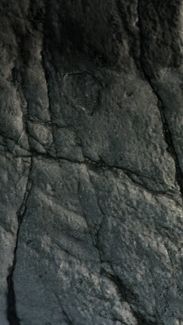 closeup of a rough grey rock