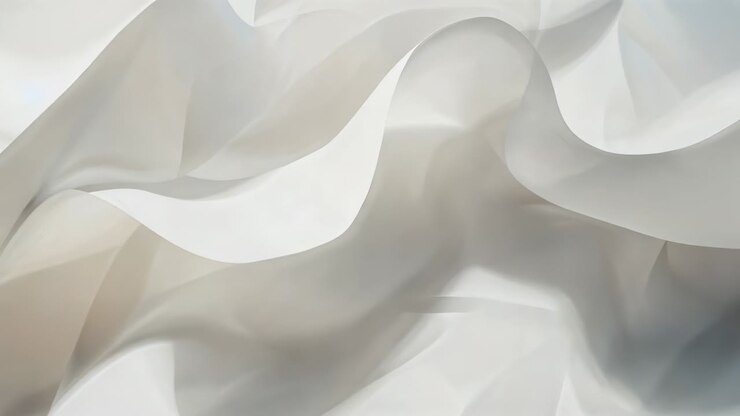 Spostamento della fotocamera che causa la piegatura del tessuto di seta bianco e mostra il bordo smerlato, cresta in studio macro