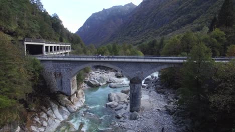 aerial-view-of-Crystal-clear-turquoise-mountain-river-Verzasca-valley-in-Swiss-alps