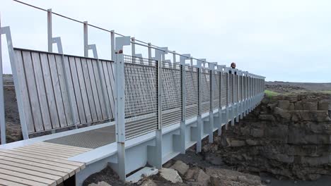 bridge between continents -iceland - reykjanes peninsula - bridge between continents. a place where the north - american an eurasian plate meet.