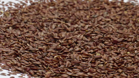 Fresh-yogurt-flax-seeds-rotation-in-super-slow-motion-closeup.-Superfood-concept