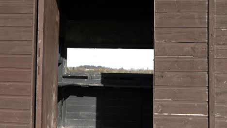 Wooden-bird-watching-hide-entrance-zoom-out-shot