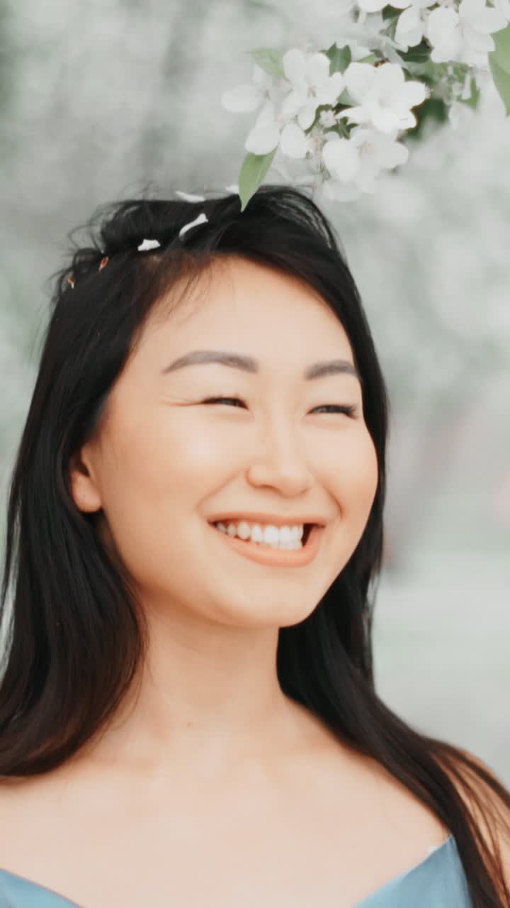 Happy Woman in a Spring Garden